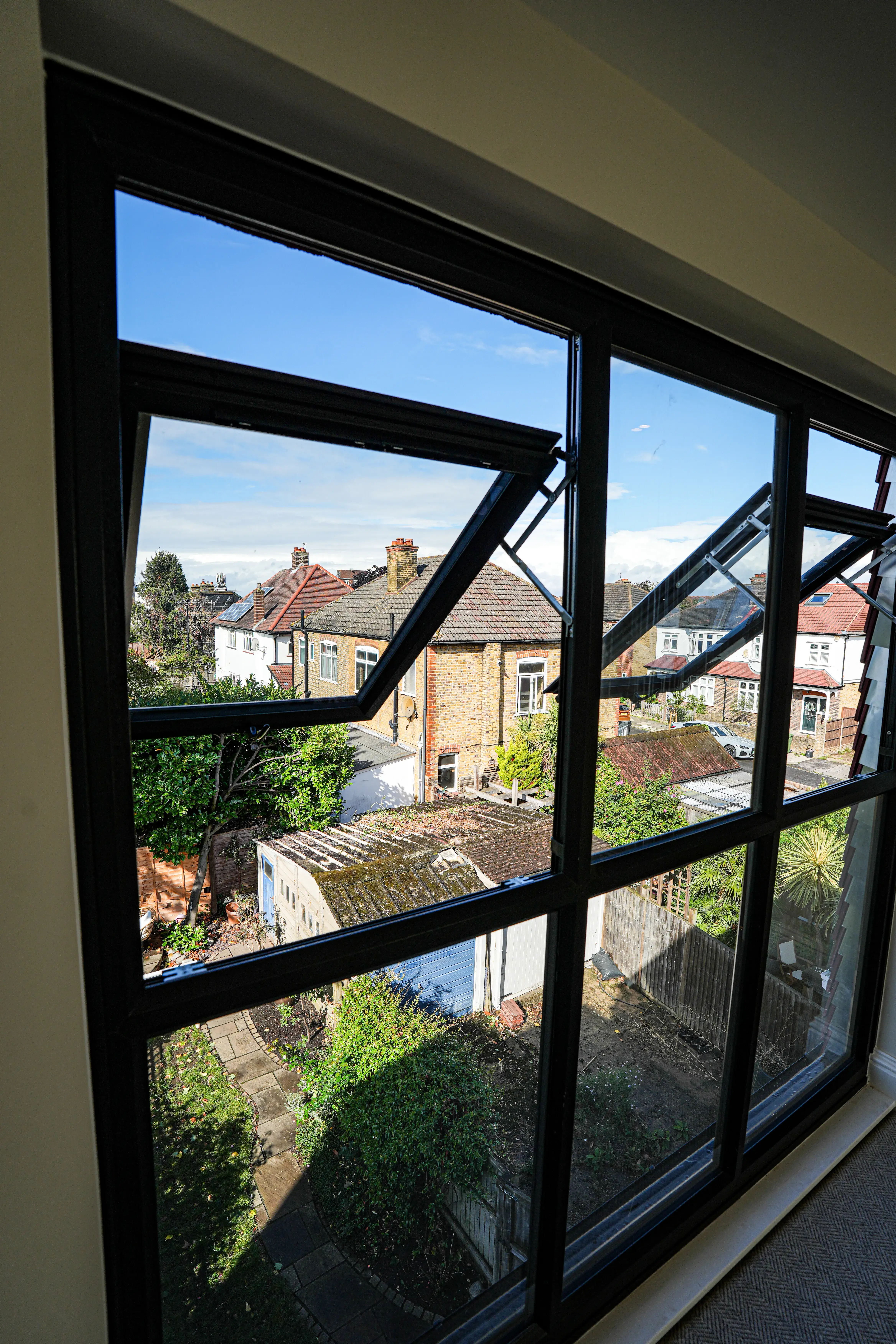 A view of a house through a window.